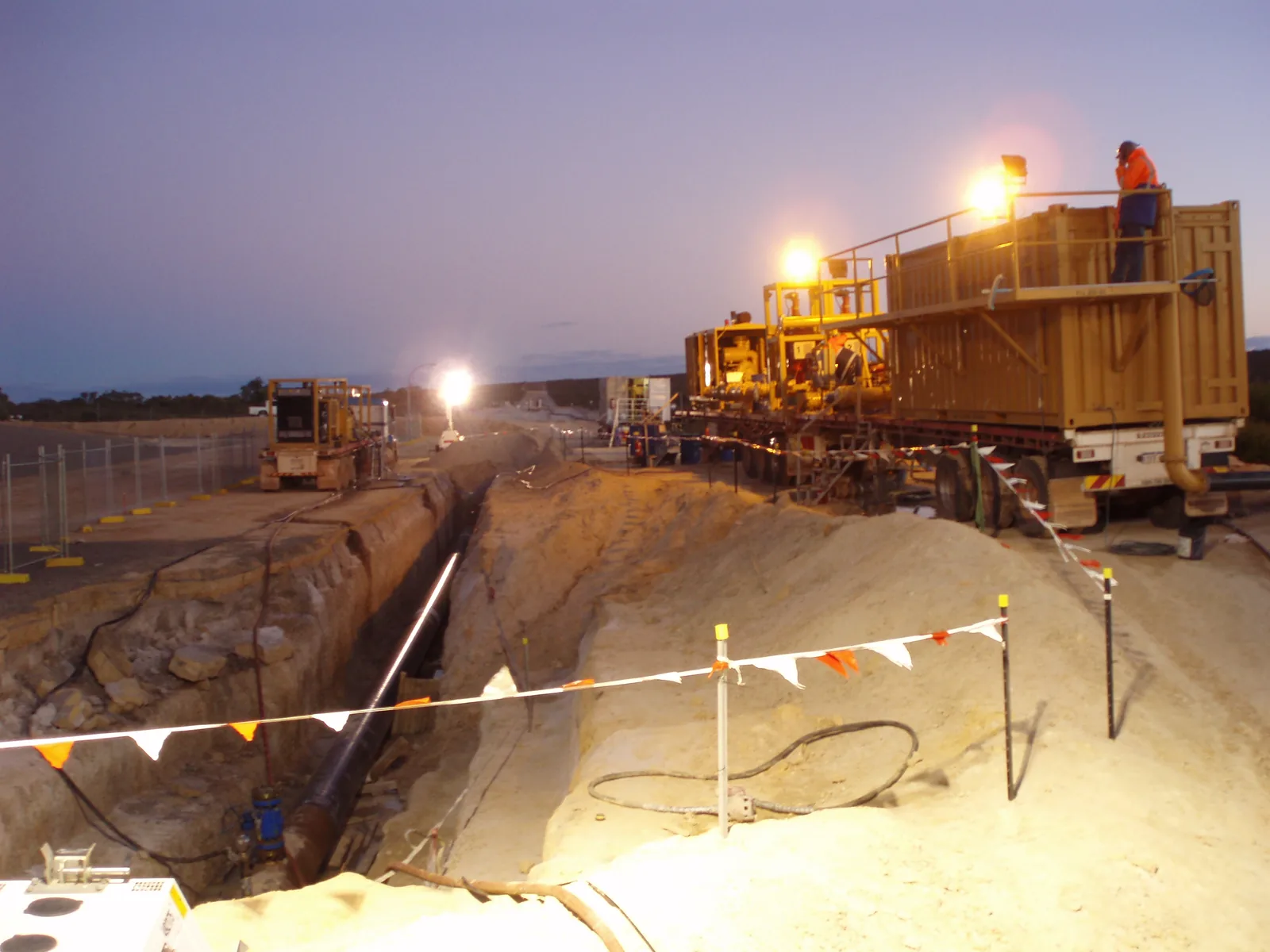 Pipeline hydro test site at dusk